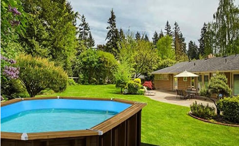Piscine hors sol rectangulaire en bois JARDIN 560: bois naturel en harmonie avec le jardin.