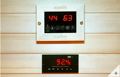 Sauna infrarouge en bois de pruche avec radiateurs, panneau de commande