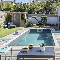 Piscine enterrée en acier avec escalier 7x3 h135